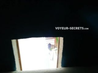 Careful voyeur spied a showering woman-2