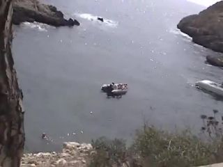 Zooming on girls in the  boat-0