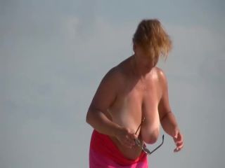 Gigantic mature tits on a beach Voyeur!-2