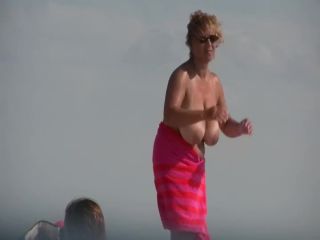 Gigantic mature tits on a beach Voyeur!-3