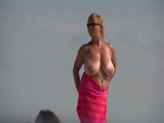 Gigantic mature tits on a beach Voyeur!-4