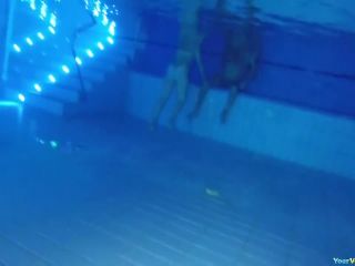 Underwater nude woman swimming-0