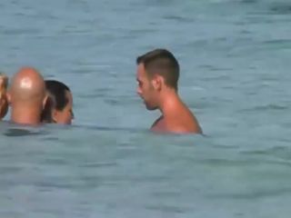 Swinging nudists spied on a beach GroupSex!-1