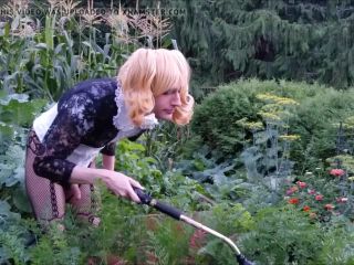 Pervert Sissy Kali takes care of her garden with an ass plug inside-2