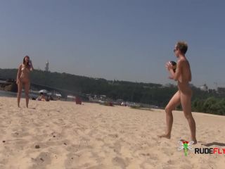 Slim teen with perky boobs naked at a nudist  beach-6