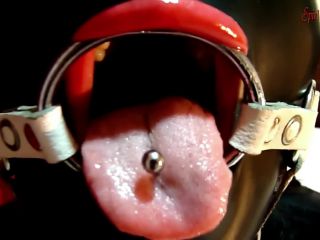 Unknown   INTRO Black latex slut with ring gag deepthroated cock...-2