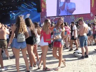 Sexy friends in shorts on a music festival voyeur -5