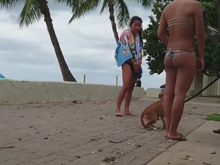 Hot girls play with dog by the beach-1
