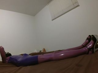 Fully encased purple latex doll-9