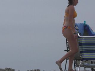 Zooming in on nice ass in very colorful bikini-3
