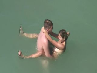 Voyeur notices they fuck in the water nudism -2