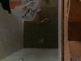 Girl notices a hidden shower camera-9