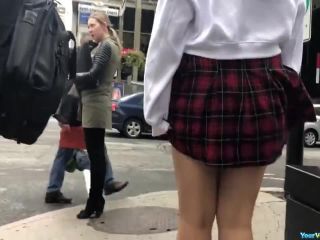 Wind lifts teen short skirt-8