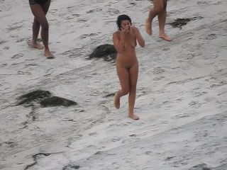 Nude beach, amateur girl shows tits and pussy-2