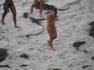 Nude beach, amateur girl shows tits and pussy-4