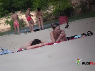 Nudist girl flashing at beach  2-5