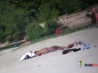 Nudist girl flashing at beach  2-6