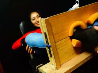 Brisa black nylons tickling in the stocks bondage -8