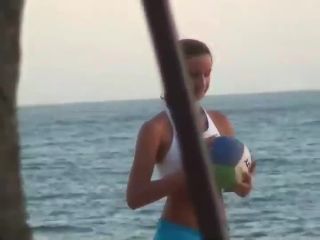 Girls playing volleyball in a tight  bikini-2