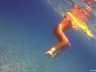 Underwater nudist swimming-0