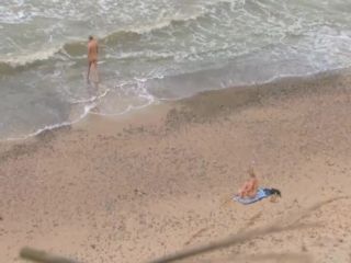 Older guy fucks a teen girl on a beach Voyeur-9