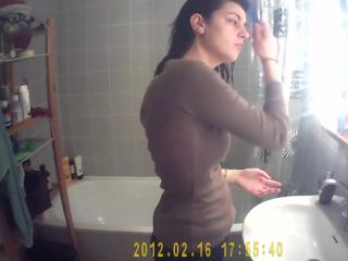 Hot girl's tits spied while washing  teeth-7