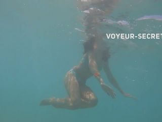 Voyeur swims close to hot teen girl-1