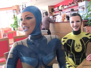 Through the city in a tight latex costume-9