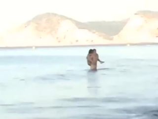 Wild fuck in the water caught by a voyeur Nudism!-6