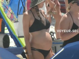 Sexy pregnant woman on the beach-1