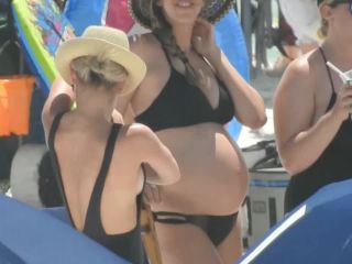 Sexy pregnant woman on the beach-5