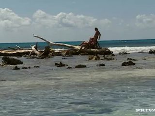 Jamie Brooks Lies in the Sand While Two Men Enter Her-5