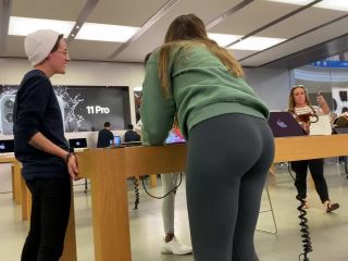 Breathtaking girl bends over a tall desk-7