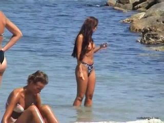Spy video of a hot brunette on the  beach-7