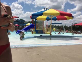 Sexy girl in red two piece bikini at the swimming pool-0