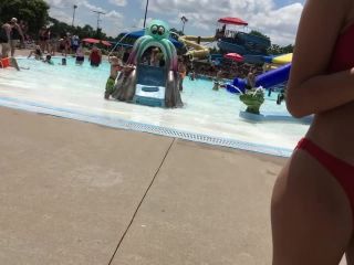 Sexy girl in red two piece bikini at the swimming pool-2