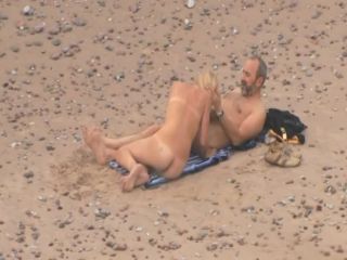 Older guy fucks a teen girl on a beach-0