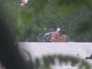 Doggy style fuck caught on the beach Nudism!-4