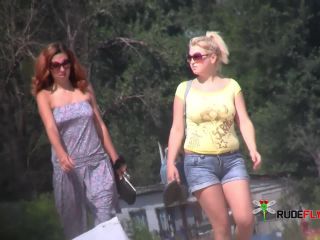 Young nudist friends naked together at the beach  2-4