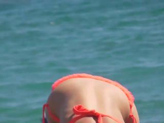 Sexy milf does a handstand on beach-7