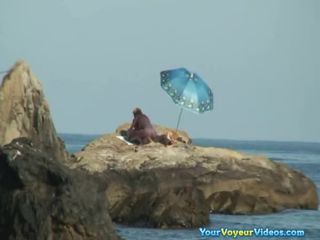 Couple caught fucking in the  rocks-2