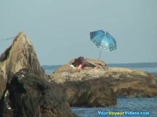 Couple caught fucking in the  rocks-7