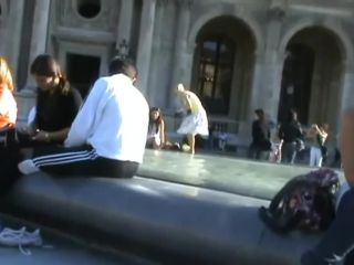 Upskirt of a girl by the fountain-0