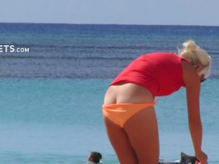 Milf's bikini malfunction on beach-4