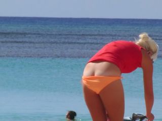 Milf's bikini malfunction on beach-7