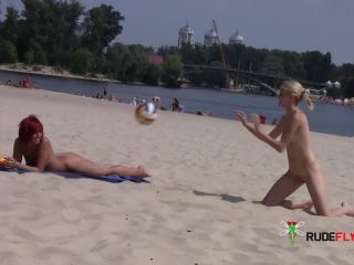 Hot babe sunbathes on nude  beach-1