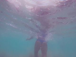 Underwater spying on young mermaid-1