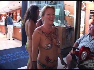 Hot girls show tits and pussy at Fantasy Fest Key West Public-4