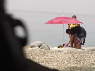 Chubby girl undresses at the beach BigAss!-3