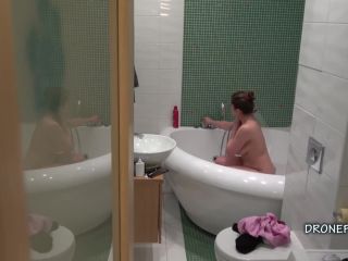 Chubby busty girl taking shower. hidden cam-2